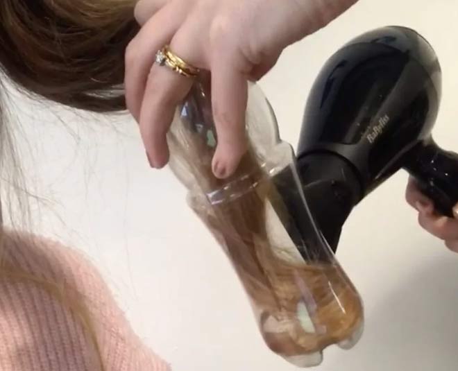 hair curl and bottle