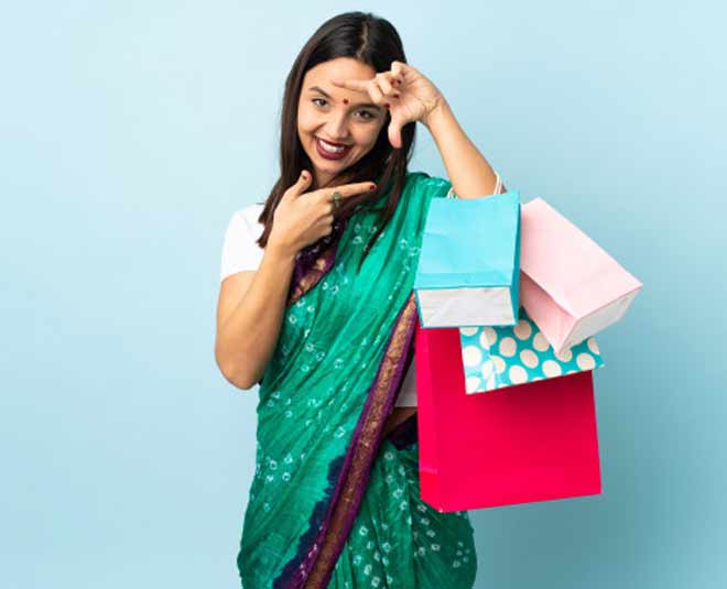 indian woman with shopping bags inside