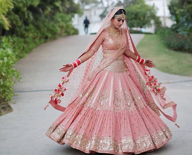 Brides in clearance pink lehenga