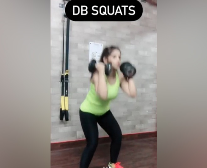 dumbell squats inside 
