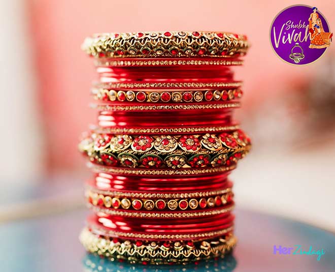 red bangles with gold design