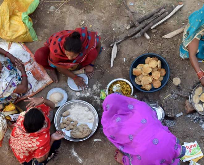 devotees with belongings