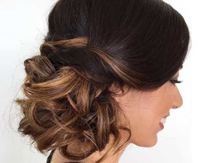 messy side bun hairstyle