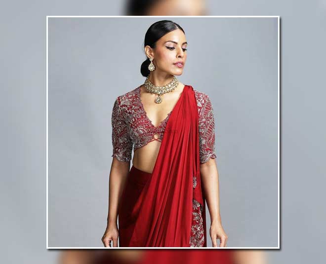 Bridal Blouses With Plunging Necklines Are Ruling The Current Wedding Season