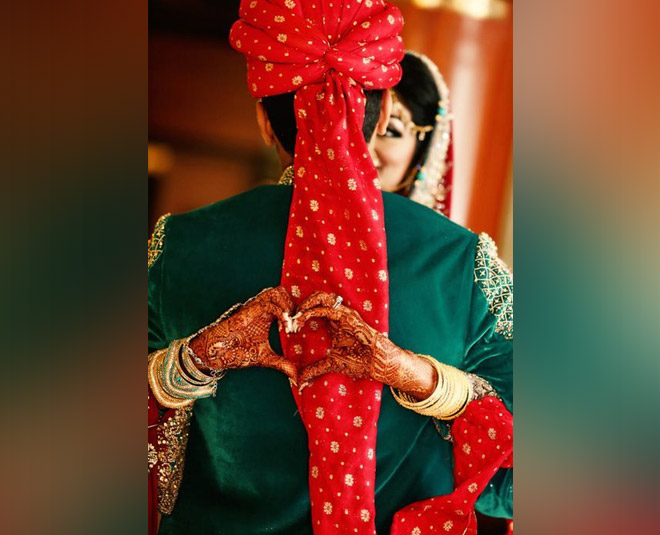 A skih bride & groom pose for formal wedding photos just after their  wedding ceremony at a temple in Queens, New York Stock Photo - Alamy