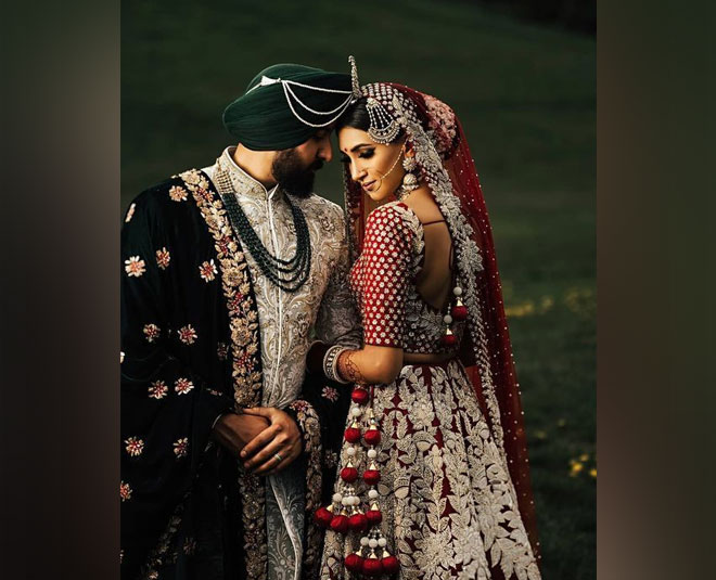 Premium Photo | Pretty wedding couple poses in a green spring garden