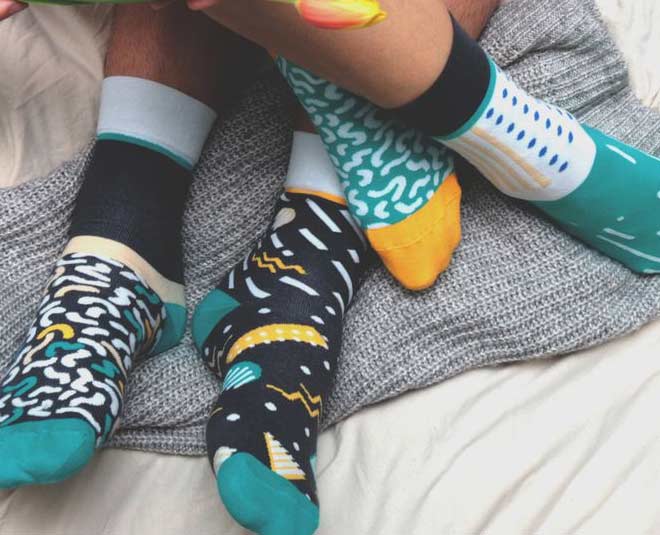 The great sock debate: do socks go over or under leg warmers?