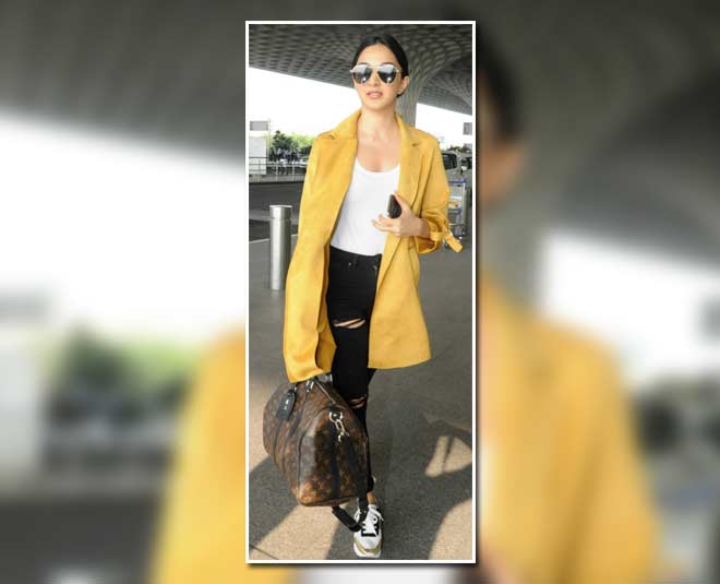 Deepika Padukone's Airport Look Is Complete With A Tan Trench Coat And Her  Louis Vuitton Bag