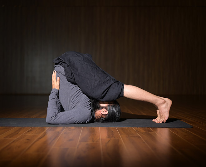 Halasana for face tighting