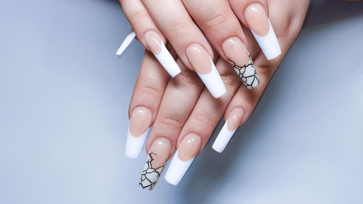 Premium Photo | Manicure and nail extension with acrylic and gel the design  is made with reflective gel polishes