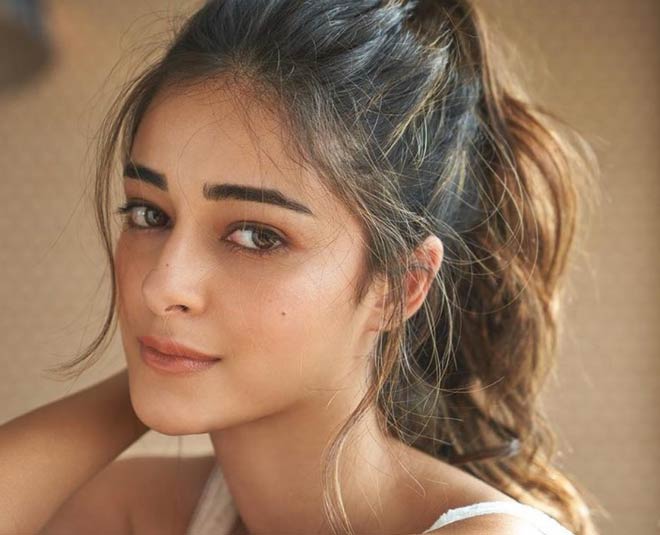 high messy ponytail hairstyle