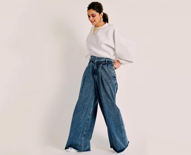 sweater and bell bottem jeans