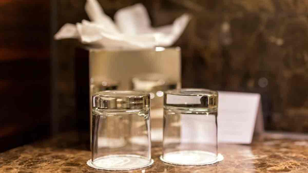 How should you check hotel glasses