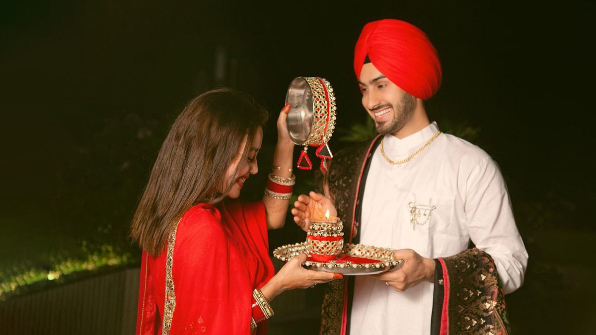 TogetherForever Upload a picture with your husband. 3 most fashionable  couple gets a gif… | Karvachauth photoshoot, Poses for karwachauth, Photo  poses for couples