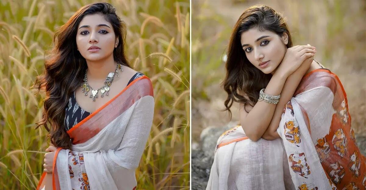 Beautiful Indian young girl in Traditional Saree posing outdoors 4982536  Stock Photo at Vecteezy