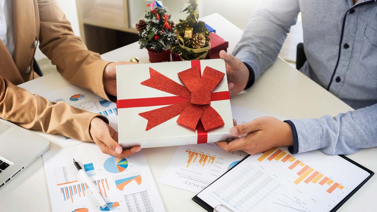 10 Easy Secret Santa Gifts To Impress Every Coworker | Gifting Owl