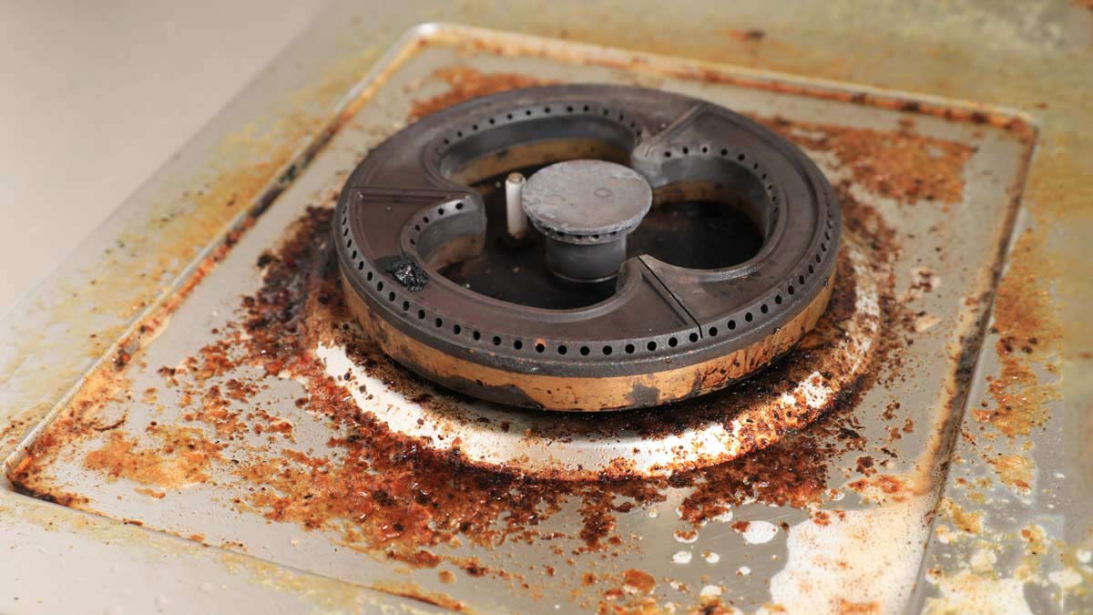 how to clean burnt gas stove in hindi