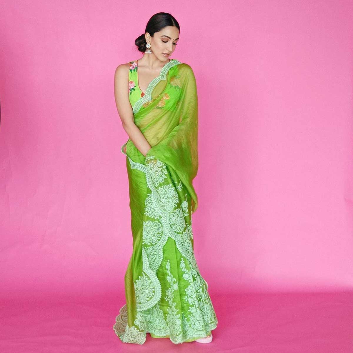 Style like a Bollywood actress on a green teej with a green saree