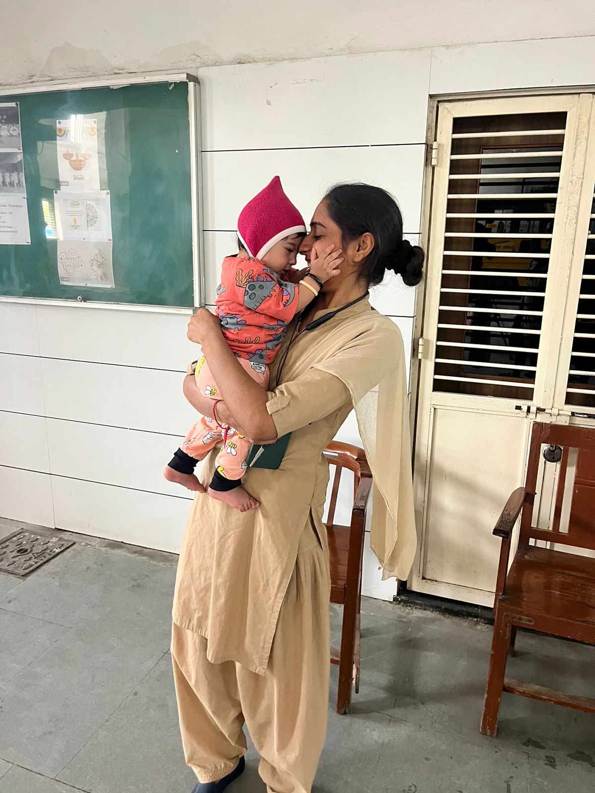 gujarat constable taking care of baby