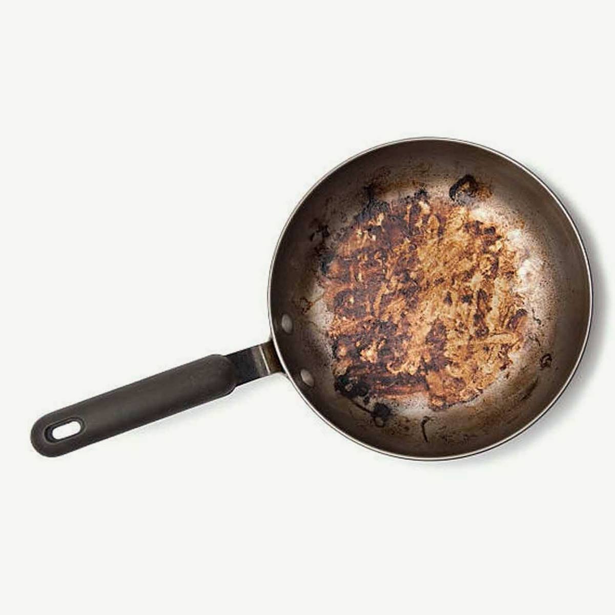 how to remove dirt from iron tawa