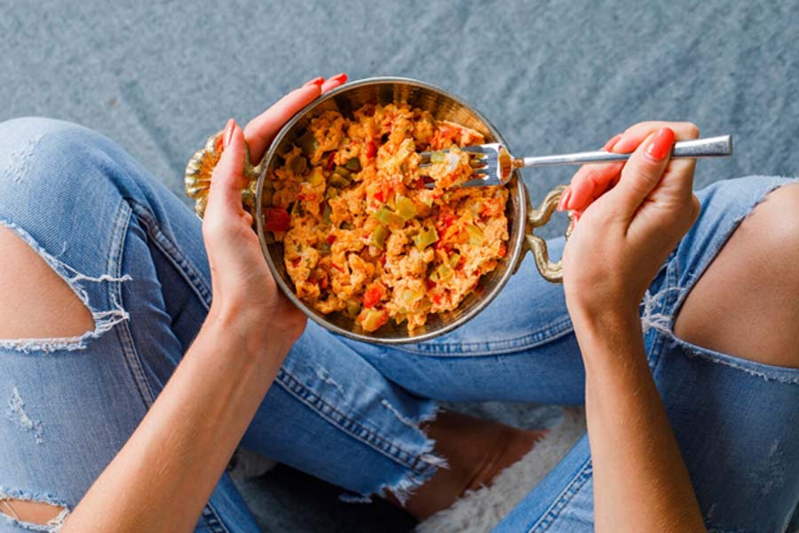 eating food in standing position