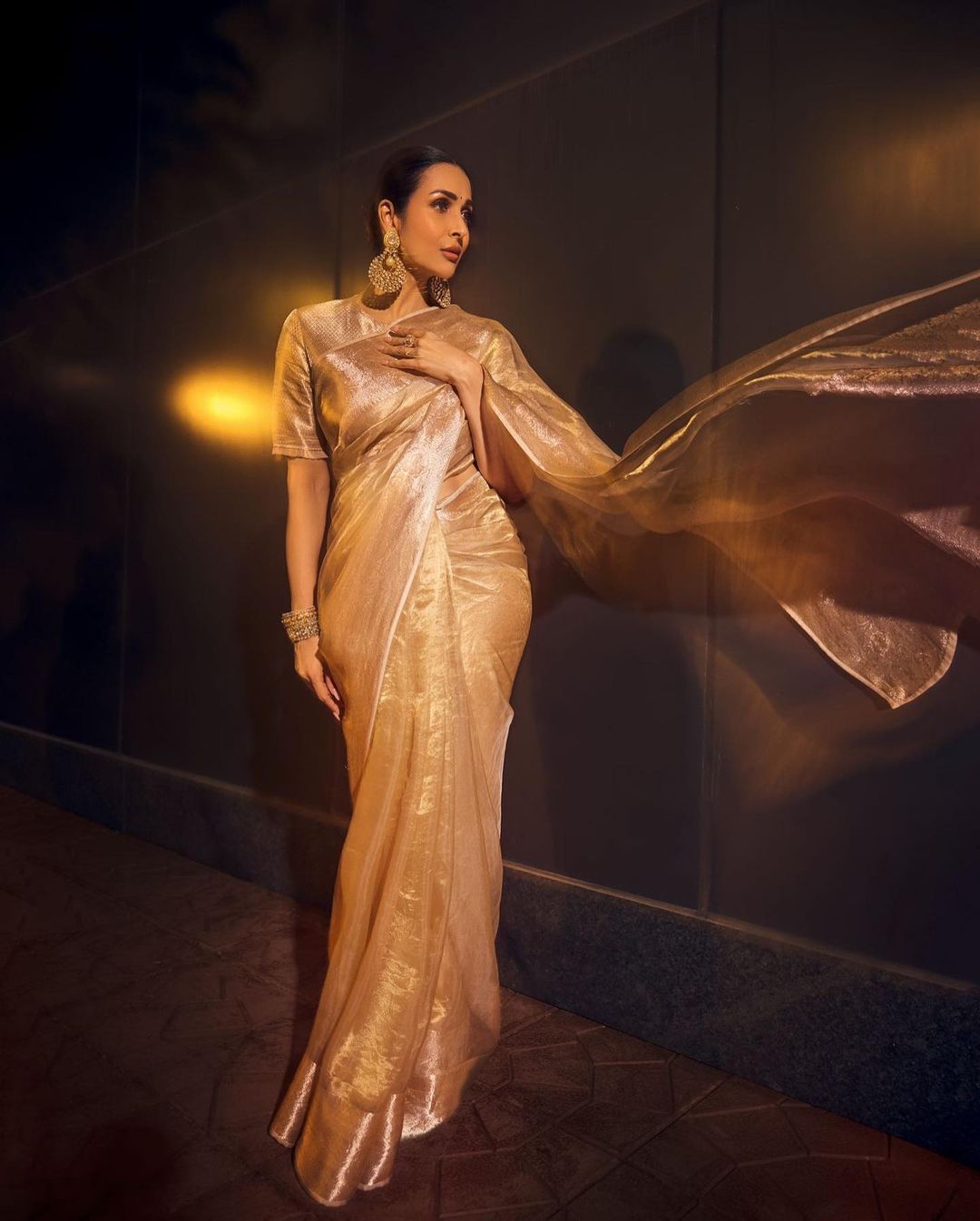 golden colour tissue saree design