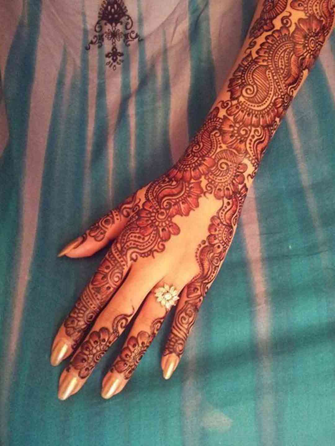 The Art of Mehndi: Celebrating Love and Beauty in Indian Weddings –  Timeless Indian Jewelry | Aurus