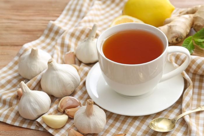 garlic water to lower cholesterol