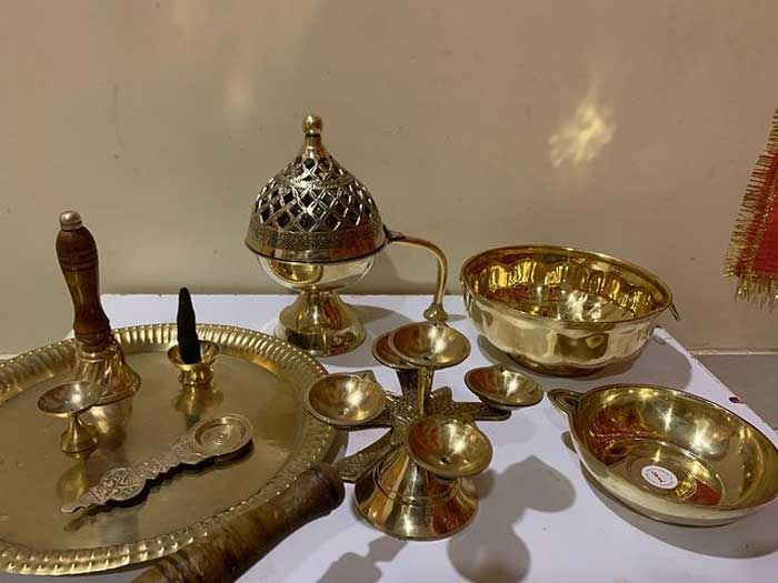 way to clean sticky stains of puja utensils