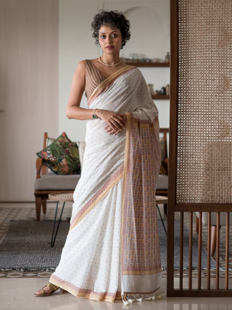 Perisan and cream colour saree
