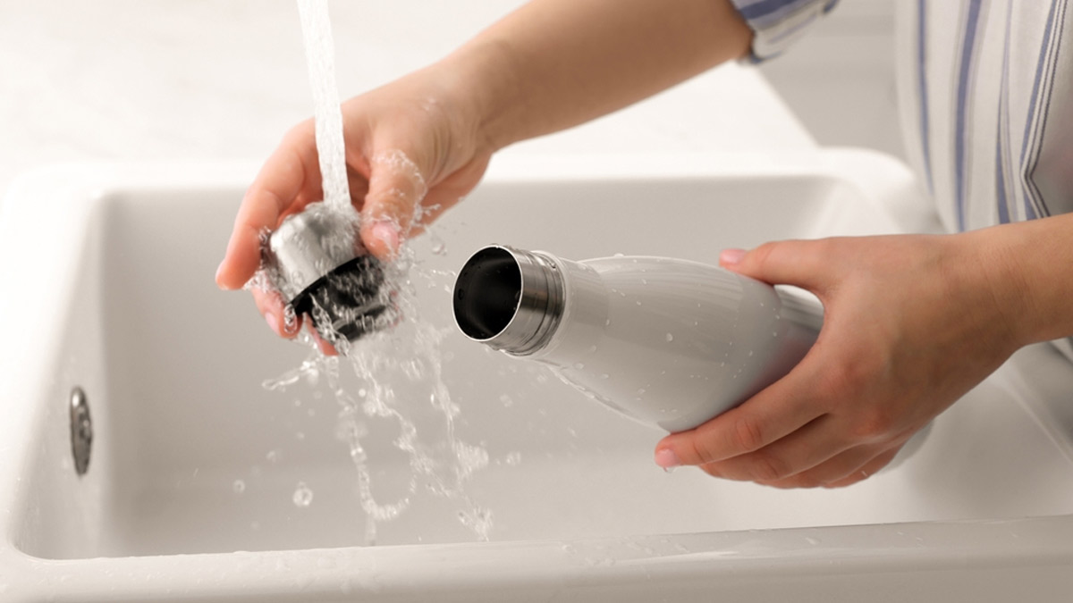 clean bottle with soap