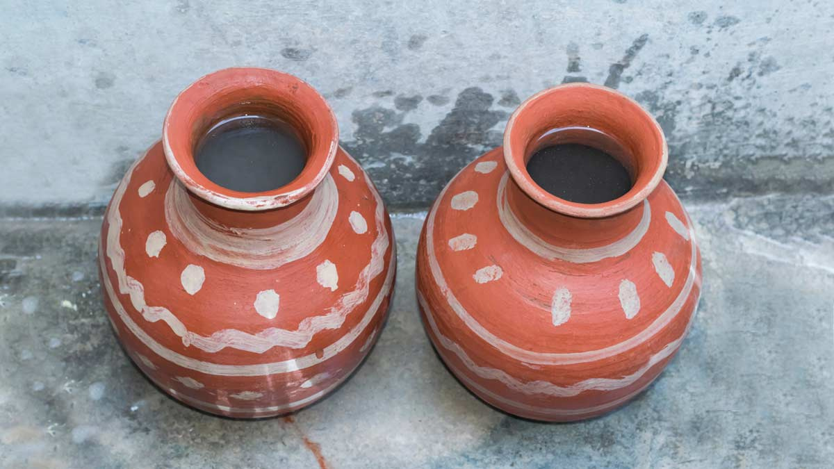 how do you clean an earthen water pot
