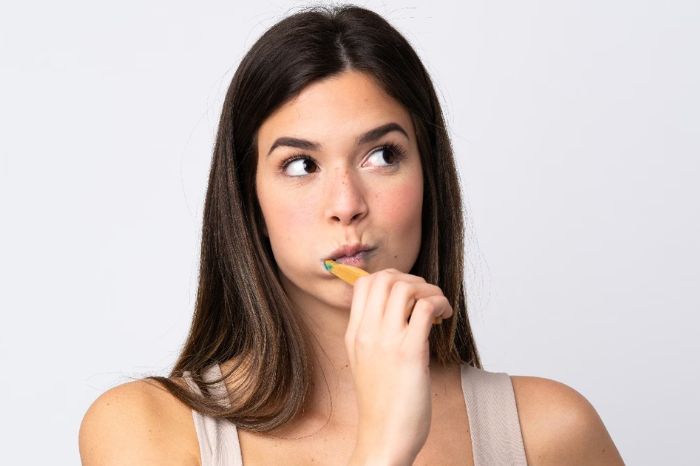 What are the problems if you don't brush your teeth twice a day 