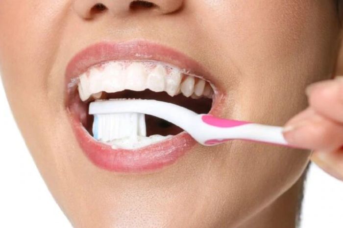 What are the problems if you don't brush your teeth twice a day 