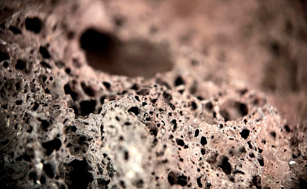 macro photograph piece porous rock with texture  