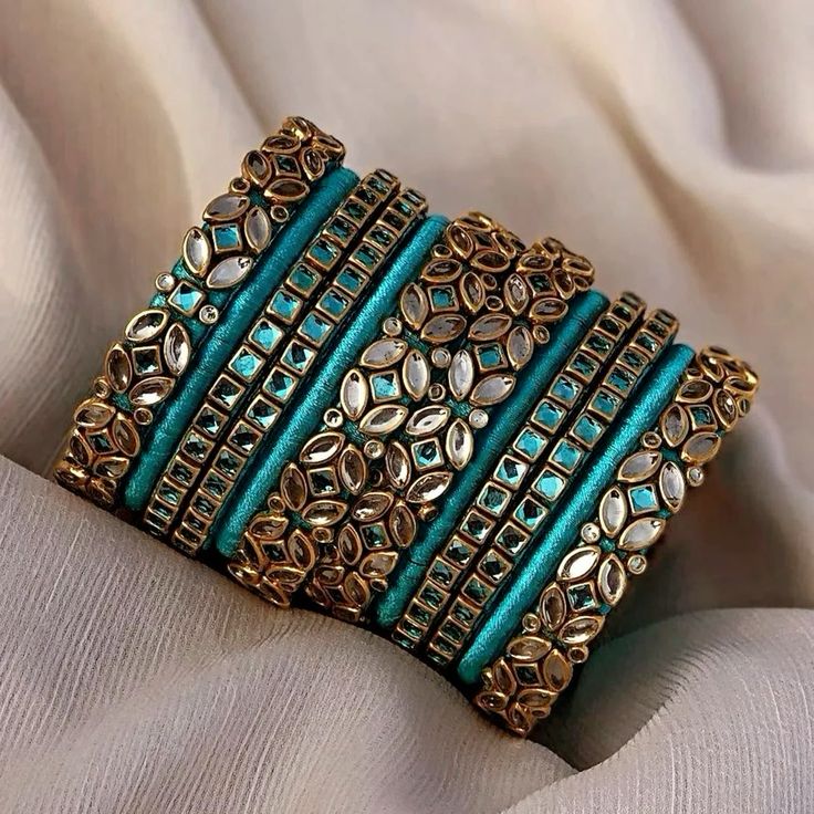 teal and gold kundan bangles designs