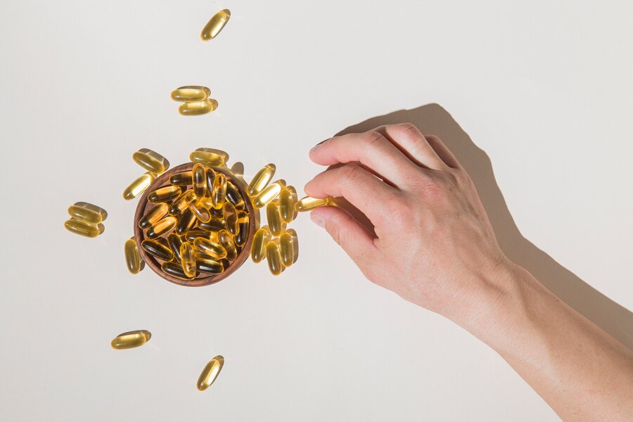 top view hand picking medical capsules  
