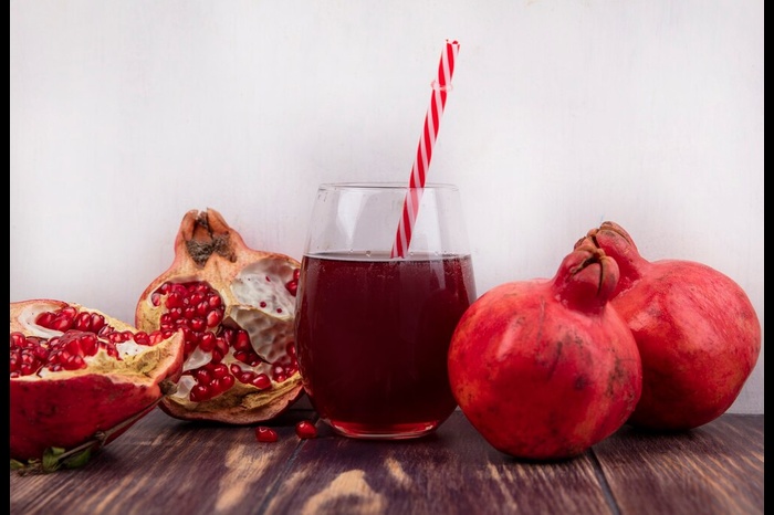 pomegranates with glass juice red