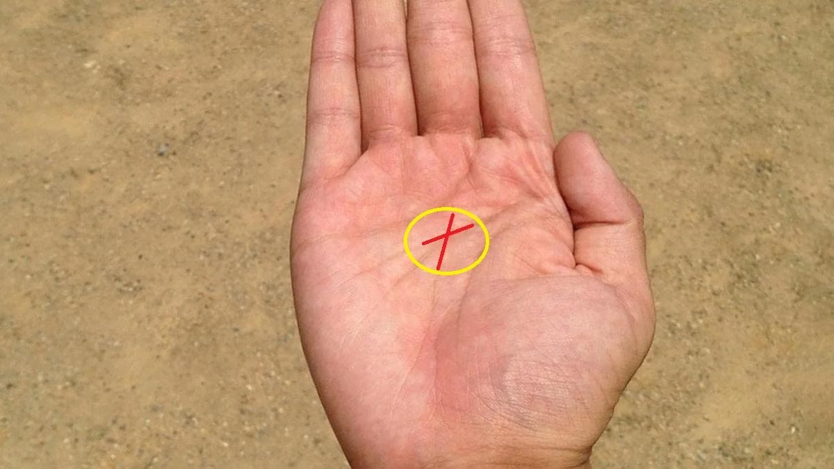 x on centre of palm meaning