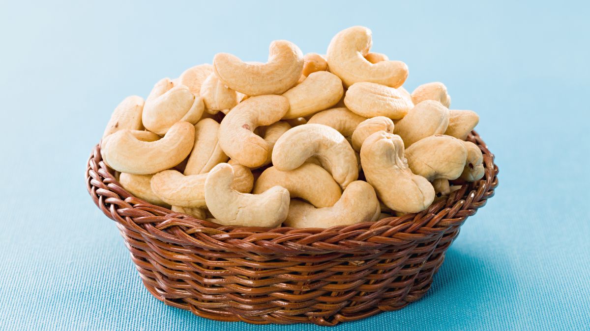 Offer Cashews To Lord Ganesha