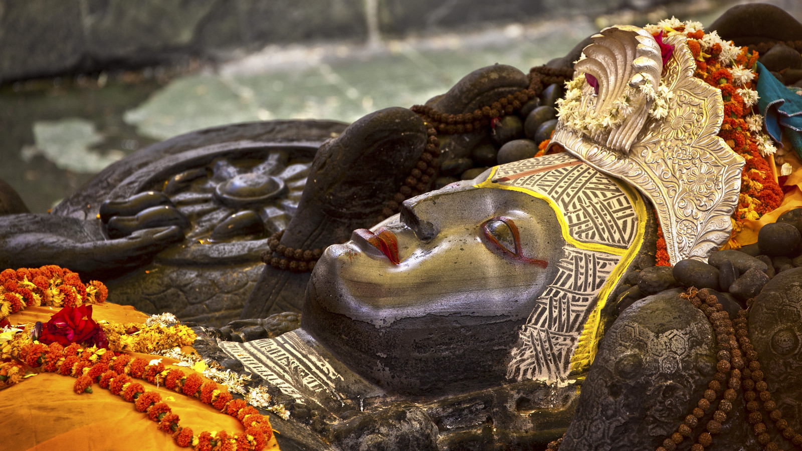 Why did Lord Vishnu sleep on snake