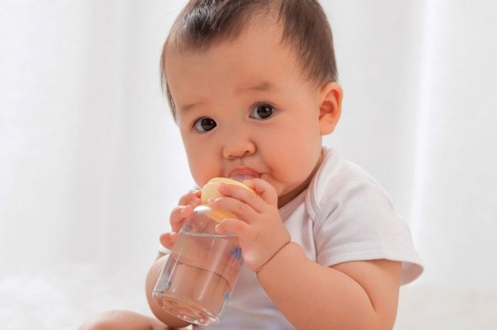 after how many months of birth should a child be given water 