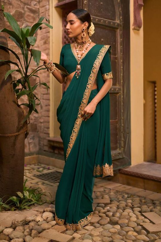 beaded contrast jewellery with green saree