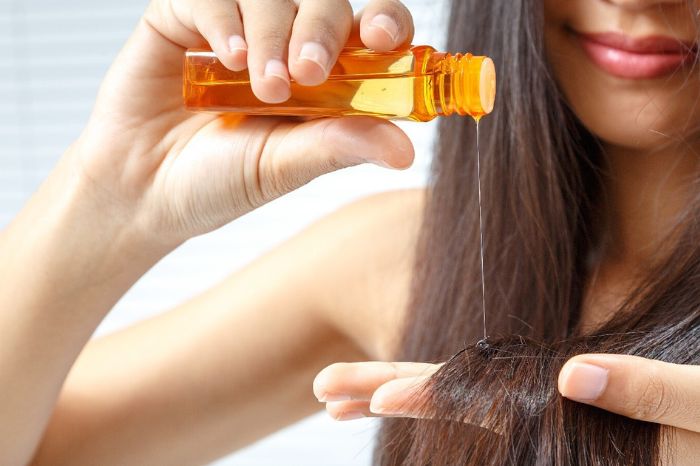 how many days in a week should apply hair oil for woman 
