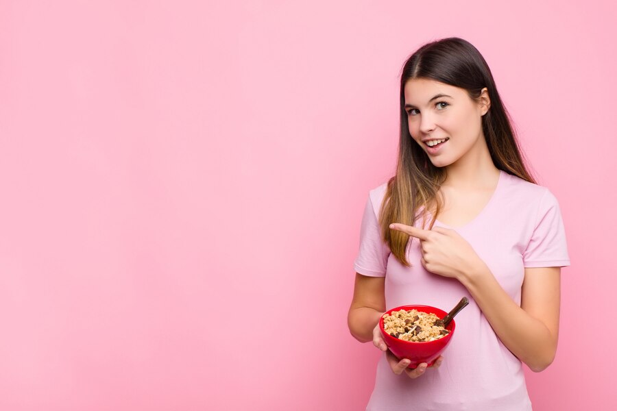 looking excited surprised pointing side upwards  