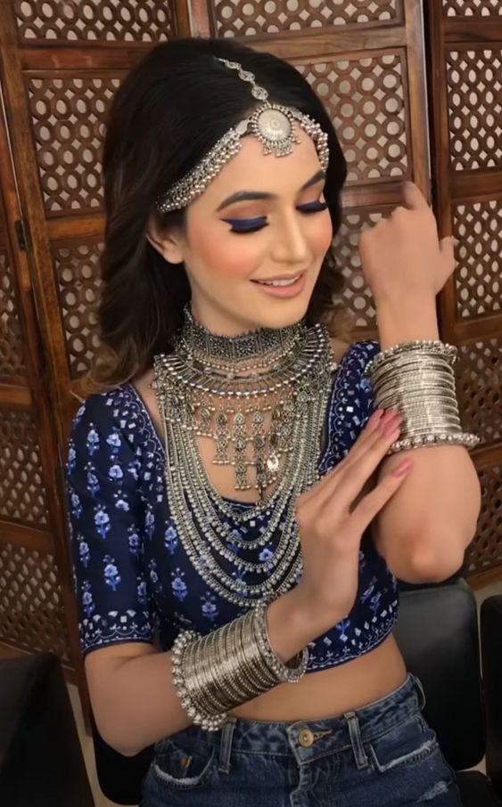 silver contrast jewellery with blue lehenga