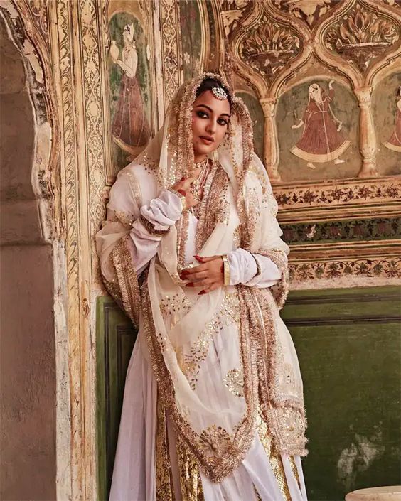 white kurta and pleated sharara