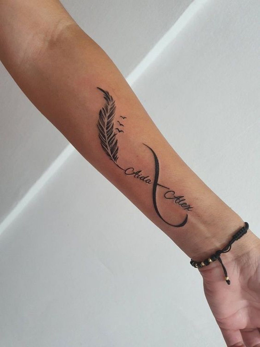 100+ Most Stunning Infinity Tattoo Ideas | Feather tattoo design, White feather  tattoos, Infinity tattoos