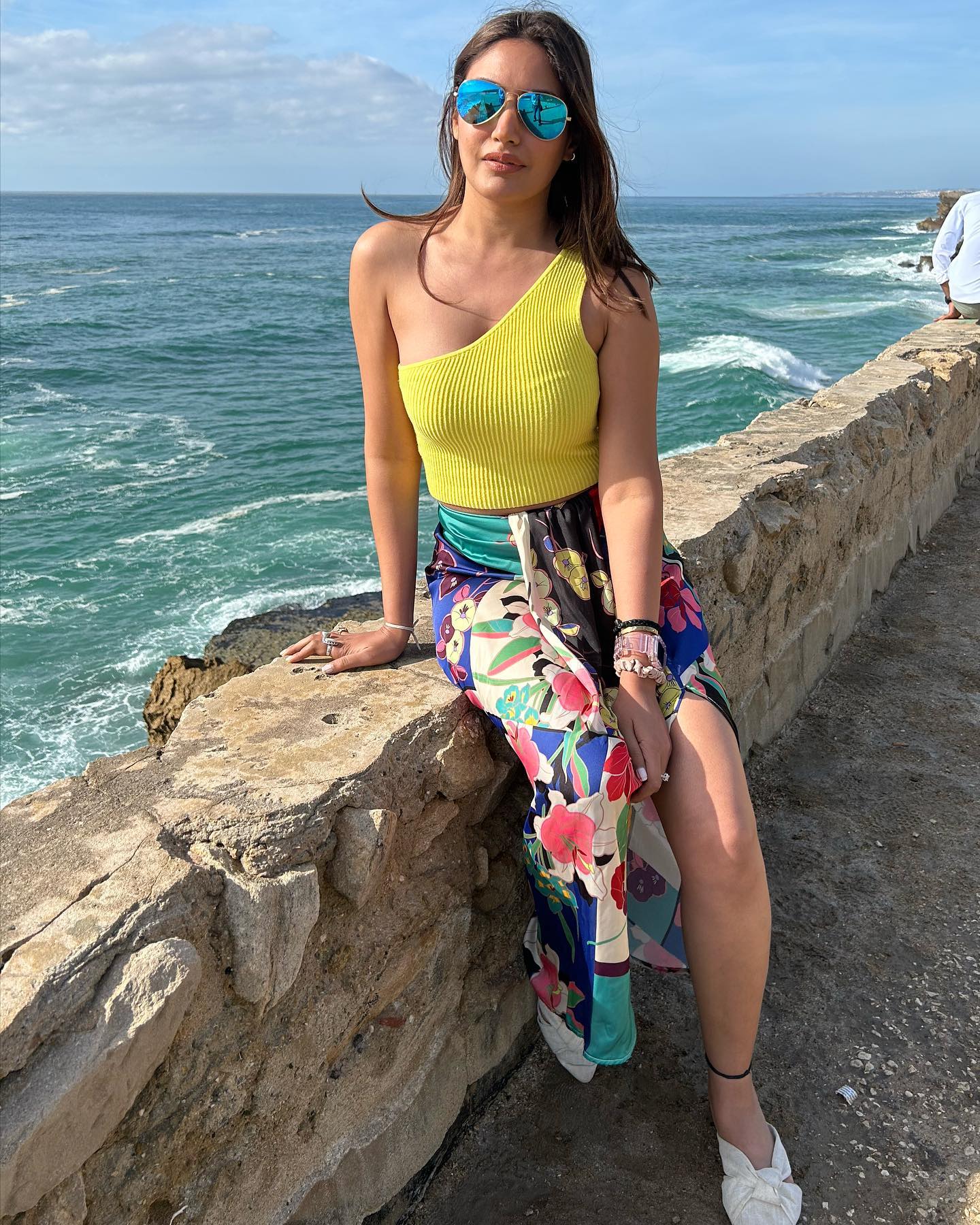 Surbhi Chandna In One Sleeved Top And Multicoloured Skirt