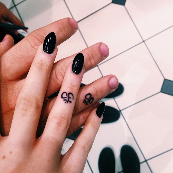 shiva tattoo designs om finger